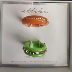 This is an Ettika 18k gold-plated ring with cubic zirconia crystals